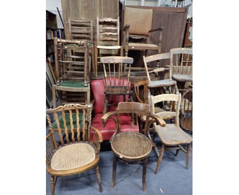 AN ERCOL UTILITY WINDSOR CHAIR, WITH STAMP and control label,  a Thonet chair, Victorian kitchen chairs, and others