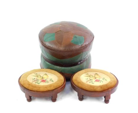 A brown and green leatherette circular pouffe, with a brown belt decoration, 44cm diameter, together with a pair of oval stai