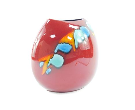 A Poole pottery purse vase, decorated in the Volcano pattern, raised marks, 25cm high.