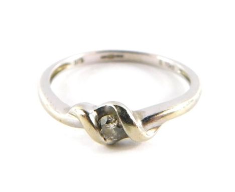 A 9ct gold and diamond ring, in a crossover design, size M, 1.7g all in.