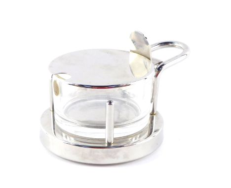 An Alessi steel and cut glass Parmasan cheese cellar, designed by Ettore Sottsass., Inox 18/10, impressed marks, 11cm diamete