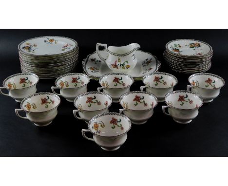 An Aynsley porcelain early 20thC part tea service, printed with stylised birds and flowers, printed mark, comprising pair of 