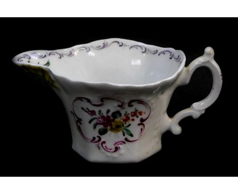 A First Period Worcester polychrome porcelain cream boat, of moulded hexagonal form with C-scroll handle, hand painted with s