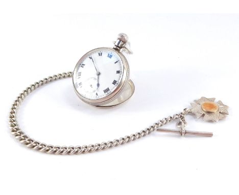 A George V silver gentleman's pocket watch, open faced, key less wind, enamel dial bearing Roman numerals, subsidiary seconds