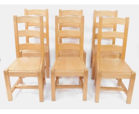 A set of six light beech ladder back single dining chairs, with solid seats, raised on square legs, united by H frame stretch