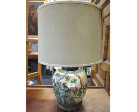 An Oriental vase lamp 55cm high including the shade  