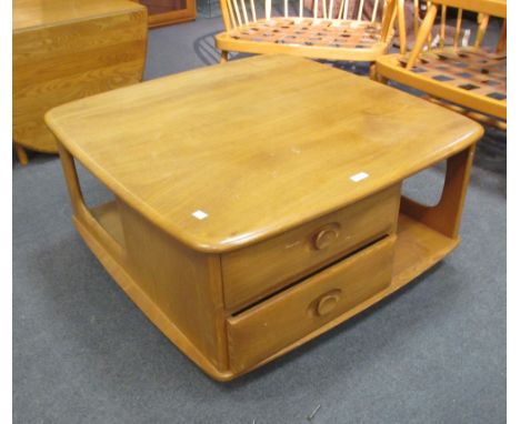 An Ercol elm coffee table containing two drawers 80 x 80cm  