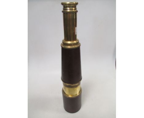 A leather clad three drawer telescope  