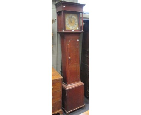 An 18th century and adapted oak longcase clock, the flat top hood with dentil moulding flanked by turned pillars with brass c