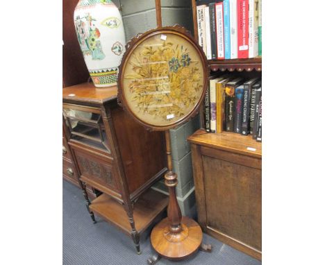 A Victorian rosewood pole screen with floral needlework panel 147cm high  