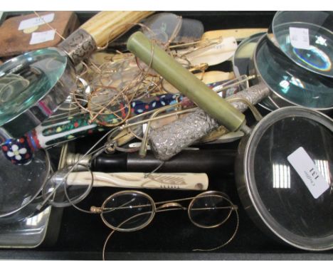 A magnifying glass with cloisonne enamel handle, another with dogs head handle, six other magnifying glasses, a collection of
