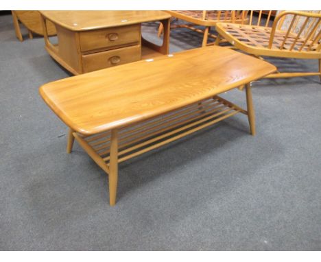 An Ercol blonde elm coffee table and another  