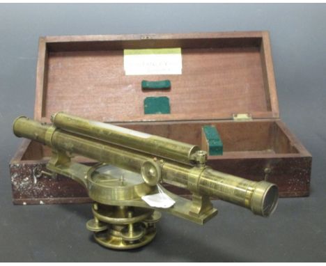 A 19th century brass theodolite, with silvered dial compass, in mahogany case labelled 'W F Stanley', instrument 46cm long  a