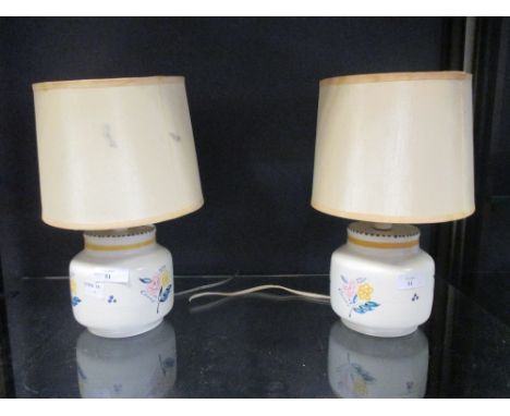 A pair of Poole pottery table lamps  