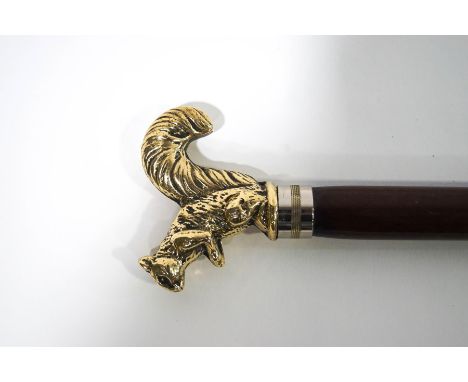 A walking stick with gilt metal squirrel knop