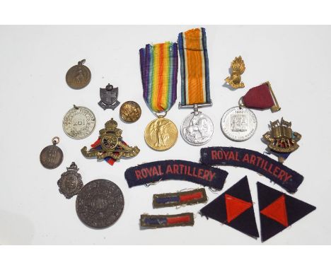 Two WWI medals, named to 266317 PTE. J.T. LEWIS. DEVON R, various military and other badges and medallions, including a Chedd