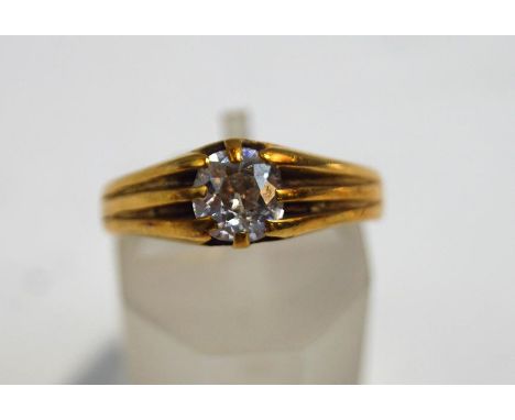 A Victorian 18 carat gold single stone diamond ring, London 1883, the old brilliant cut of approximately 0.7 carats, finger s