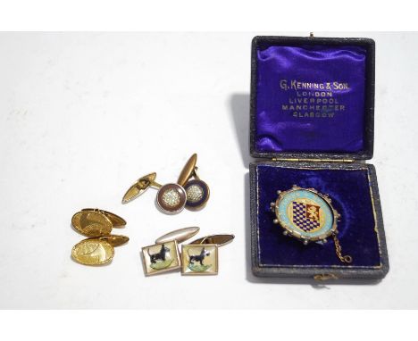 A pair of Intaglio cufflinks with a Scottie dog, two other pairs of cufflinks and a gilt and enamel disk with white metal bro