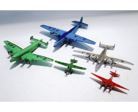 Five 1940s Meccano Dinky aeroplanes: British 40 Seater Air Liner, Giant High Speed Monoplane, Frobisher Class Air Liner, Ligh
