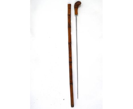 An early 20th Century swordstick with a bamboo surround and a Solingen blade