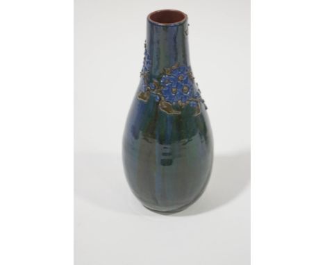 A Sunflower Pottery vase by Sir Edmund Elton, of tapering form with tall neck, decorated with flowers and foliage over a stre