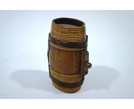 An oak barrel flask with leather straps and glass ends, 30cm high