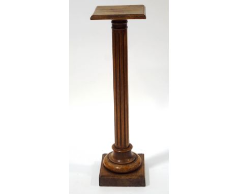 A French fruitwood torchere, with reeded and turned column, 110cm high