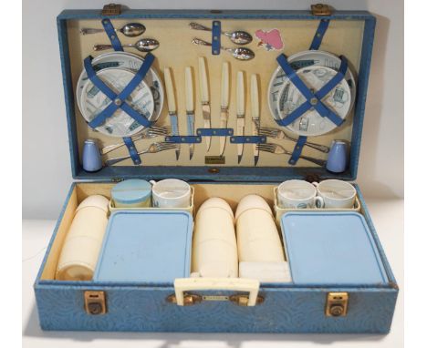 A vintage Brexton picnic hamper with china and melamine contents