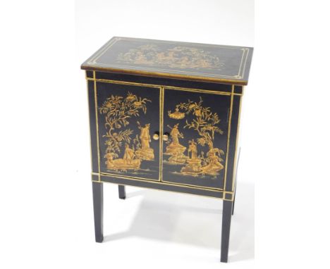 A modern lacquered and gilt cabinet with Chinoiserie decoration of figures within landscapes, the two doors enclosing a singl