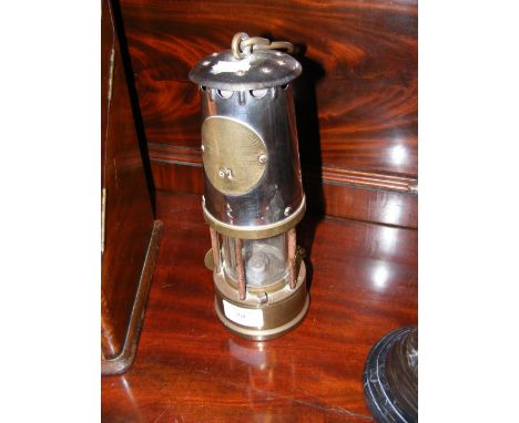 An original Miner's lamp by The Protector Lamp and Lighting Company CONDITION REPORTName on tag = N.C.B&nbsp; &nbsp;S.W.D No.