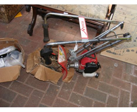 A Mantis petrol driven rotavator with spare blades and manual