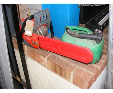 A Mitox model 415CSX petrol driven chainsaw with petrol container 