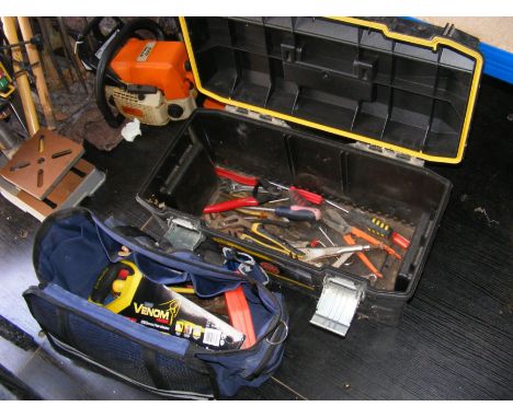 A toolbox and tool bag containing useful tools