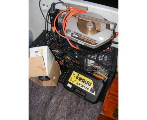 A plastic box containing various useful tools including Stanley inspection camera, together with a Black & Decker circular sa