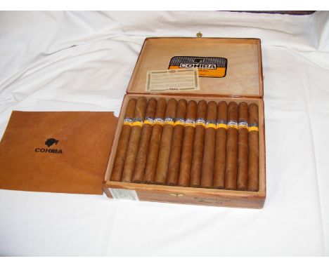 A full box of Cohiba Cuban cigars, each cigar measuring 17.5cms long with original Habanos label