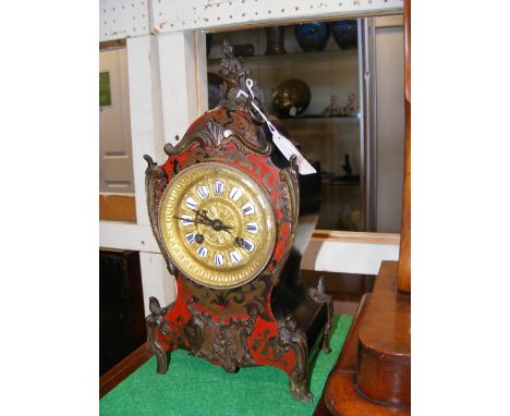 A 30cm high antique French Boulle mantle clock