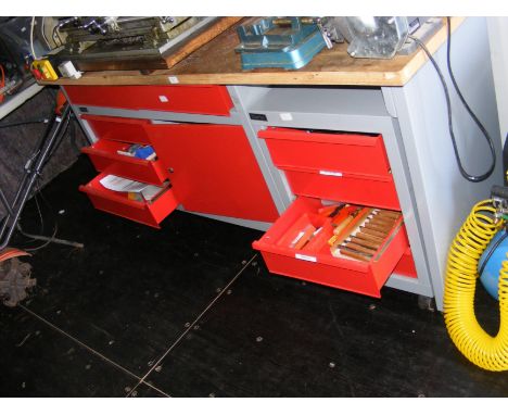The Clarke work bench with various drawers and cupboards containing tools for lot 695 and other