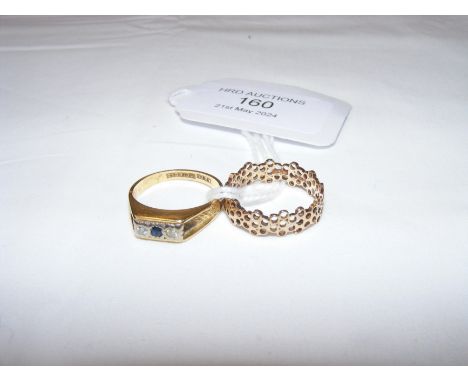 A diamond and sapphire dress ring in gold setting and one other