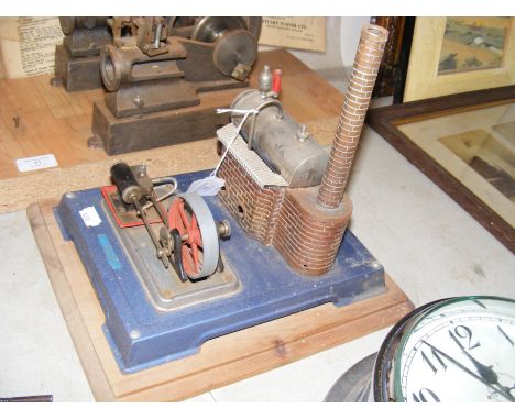 A Mamod style miniature engine on wooden base