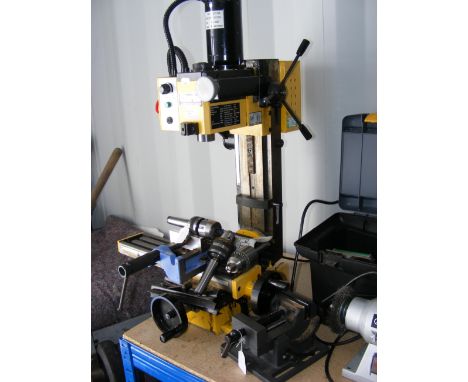 A Clarke bench mounted pillar drill with various chucks, together with a bench mounted vice etc. CONDITION REPORT no missing 