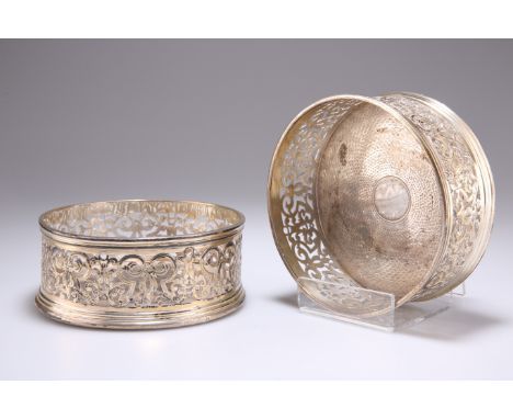 A PAIR OF WILLIAM IV SILVER WINE COASTERS,&nbsp;by&nbsp;Robert Garrard II, London 1833, circular, the pierced sides decorated