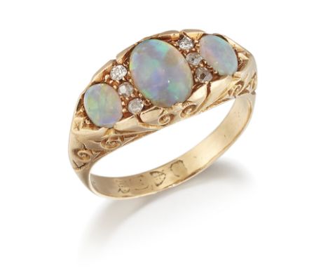 AN 18CT GOLD OPAL AND DIAMOND RING, three graduated oval opals spaced by diamond accents, to a carved gallery and shoulders, 