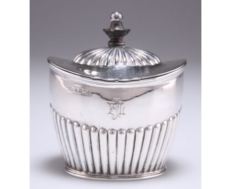 AN EDWARDIAN SILVER CADDY,&nbsp;by Atkin Brothers, Sheffield 1901, of small proportions, oval, fluted to lower half, engraved