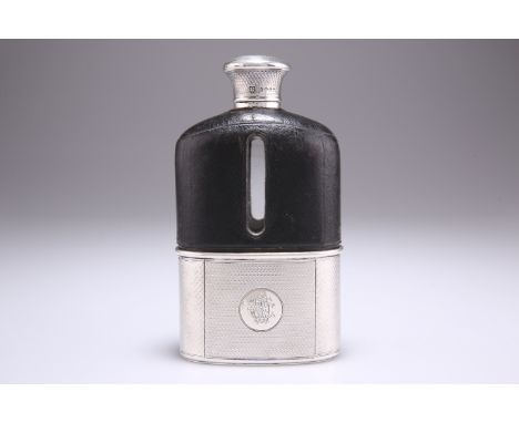 A VICTORIAN SILVER HIP FLASK,&nbsp;by&nbsp;William Thomas Wright &amp; Frederick Davies, London 1869, retailed by Asprey, the