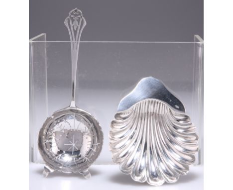 AN ELIZABETH II SILVER TEA STRAINER,&nbsp;by Francis Howard, Sheffield 1954, the deep pierced bowl with scalloped rim and two