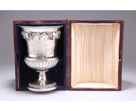 A FINE GEORGE III SILVER GOBLET,&nbsp;by&nbsp;John W Story, London 1811, urn-form, applied with a band of fruiting vine above