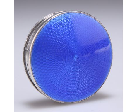 A GEORGE V SILVER AND ENAMEL BOX,&nbsp;by&nbsp;Albert Carter, Birmingham 1929, circular, the pull-off cover with blue guilloc