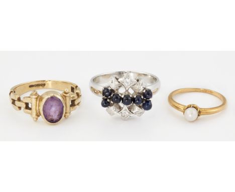 THREE GEM-SET RINGS, COMPRISING;&nbsp;A 9CT GOLD AMETHYST RING, with brick-link shank, ring size N1/2; A SAPPHIRE DRESS RING,