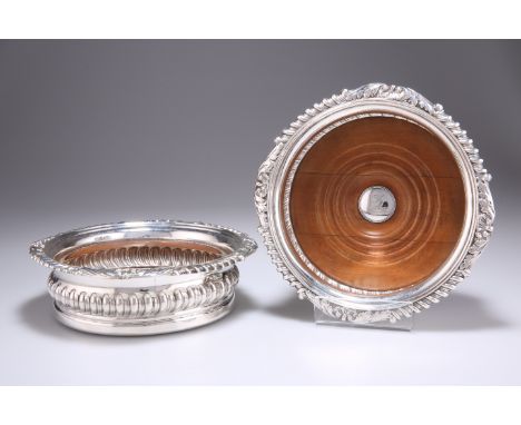 A PAIR OF GEORGE IV SILVER WINE COASTERS, by Samuel Haines, Birmingham&nbsp;1824, circular with gadrooned shell and foliate r