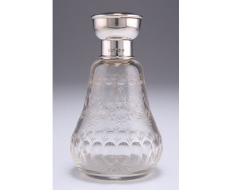 A GEORGE V SILVER AND TORTOISESHELL SCENT BOTTLE,&nbsp;by&nbsp;Oldfield Ltd, Birmingham 1925, the pear-shaped glass body cut 